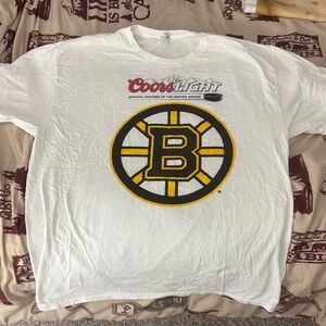 Delta White T-Shirt with Blue and Brown Logo